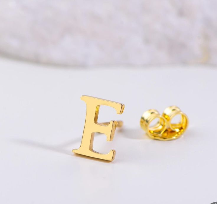 "Golden Initial Stud"